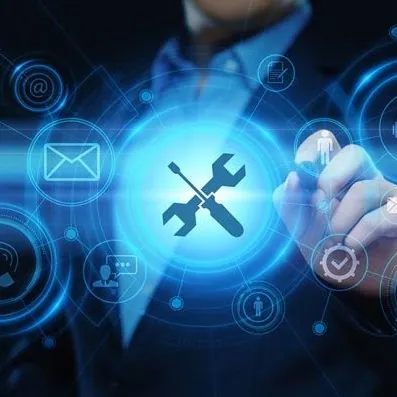 Hand pointing at a holographic IT services dashboard with tools and communication icons